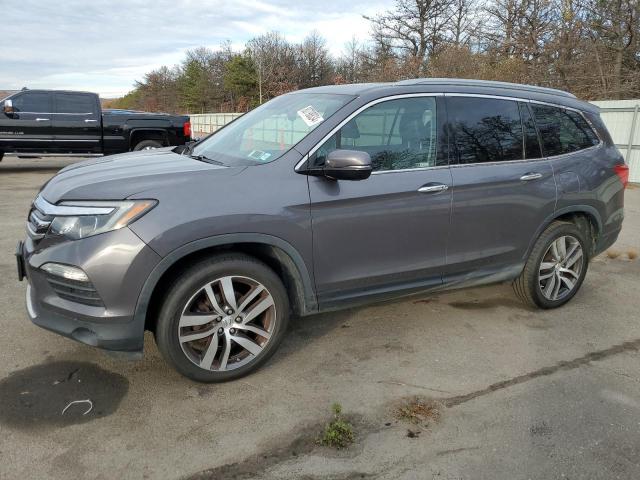 HONDA PILOT ELIT 2018 z numerem VIN 5FNYF6H06JB044080 - Zdjęcie z aukcji