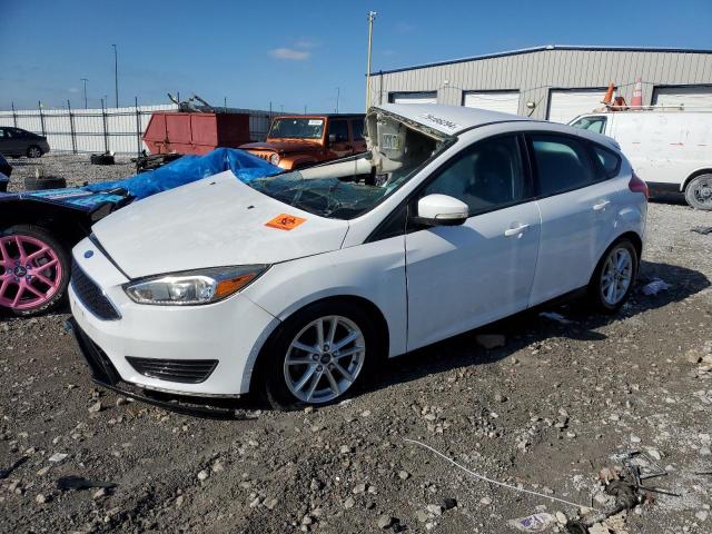 FORD FOCUS SE 2015 with VIN 1FADP3K21FL385286 - Photo from auction