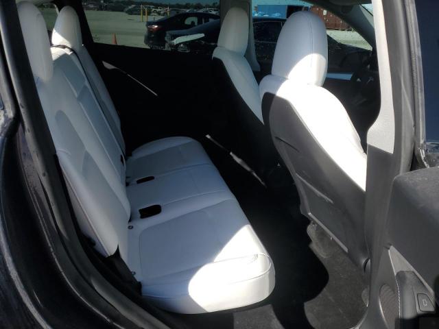Photo 11 from auction – 2023 TESLA MODEL Y with VIN 7SAYGDEE1PF859414