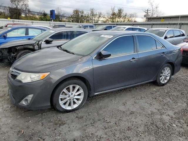 TOYOTA CAMRY HYBR 2012 with VIN 4T1BD1FKXCU056502 - Photo from auction