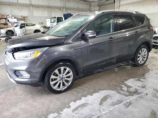 FORD ESCAPE TIT 2017 with VIN 1FMCU0J94HUD09078 - Photo from auction