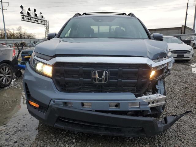 Photo 5 from auction – 2025 HONDA RIDGELINE with VIN 5FPYK3F52SB008887