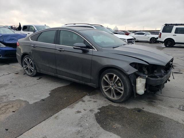 Photo 4 from auction – 2019 FORD FUSION TIT with VIN 3FA6P0D95KR210908