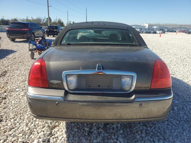 Photo 6 from auction – 2004 LINCOLN TOWN CAR E with VIN 1LNHM81W14Y627379