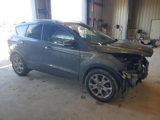 Photo 4 from auction – 2015 FORD ESCAPE TIT with VIN 1FMCU9J95FUB90068
