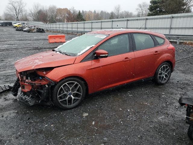 FORD FOCUS SEL 2018 with VIN 1FADP3M21JL264747 - Photo from auction