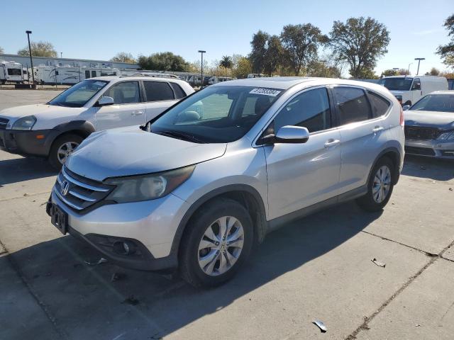 HONDA CR-V EX 2014 with VIN 2HKRM3H55EH555405 - Photo from auction