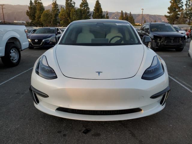 Photo 5 from auction – 2021 TESLA MODEL 3 with VIN 5YJ3E1EB8MF999487