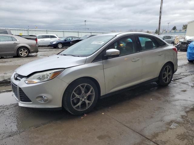 FORD FOCUS SE 2014 с VIN 1FADP3F23EL397996 - Снимка от търг