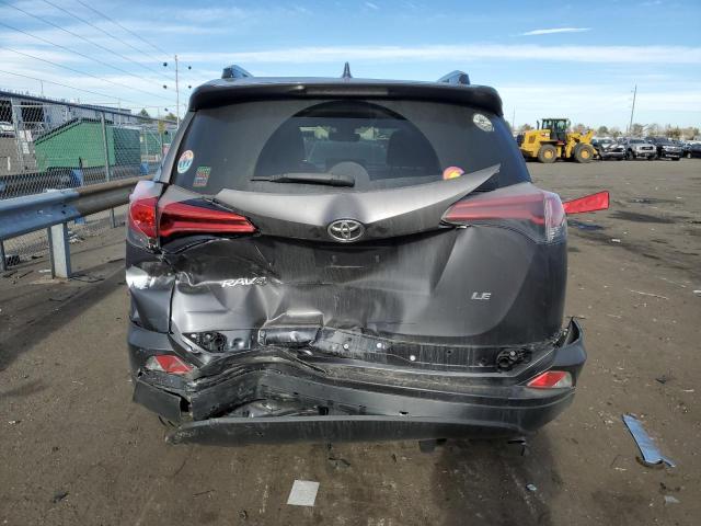 Photo 6 from auction – 2018 TOYOTA RAV4 LE with VIN JTMZFREV0JJ199464