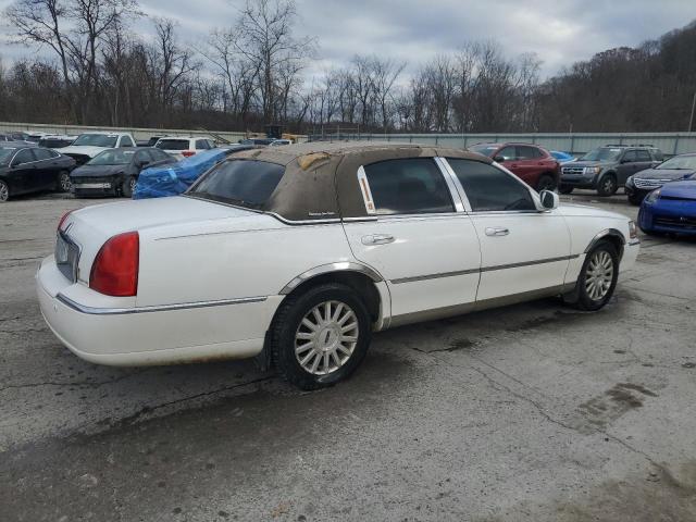 Photo 3 from auction – 2004 LINCOLN TOWN CAR E with VIN 1LNHM81W14Y619797