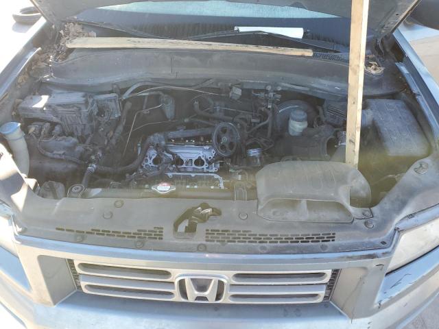 Photo 11 from auction – 2006 HONDA RIDGELINE with VIN 2HJYK16276H563221