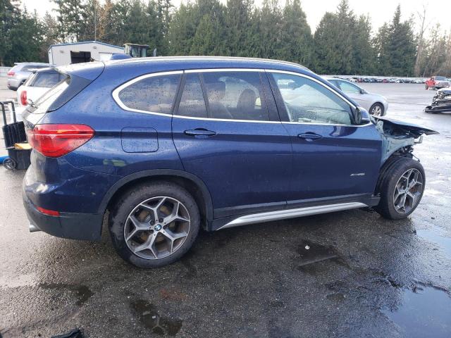 Photo 3 from auction – 2018 BMW X1 XDRIVE2 with VIN WBXHT3C36J5L24384