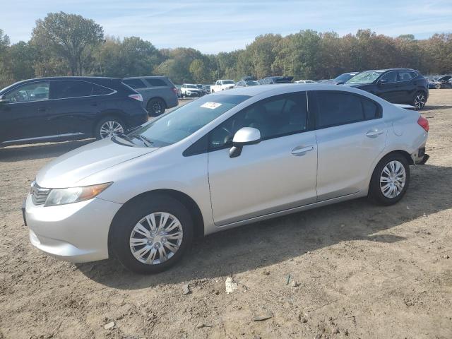 HONDA CIVIC LX 2012 with VIN 19XFB2F51CE018828 - Photo from auction