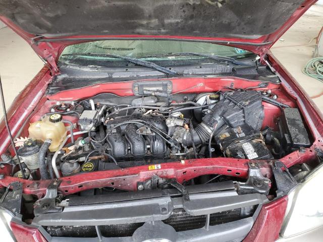 Photo 12 from auction – 2003 MAZDA TRIBUTE ES with VIN 4F2CZ96113KM49073