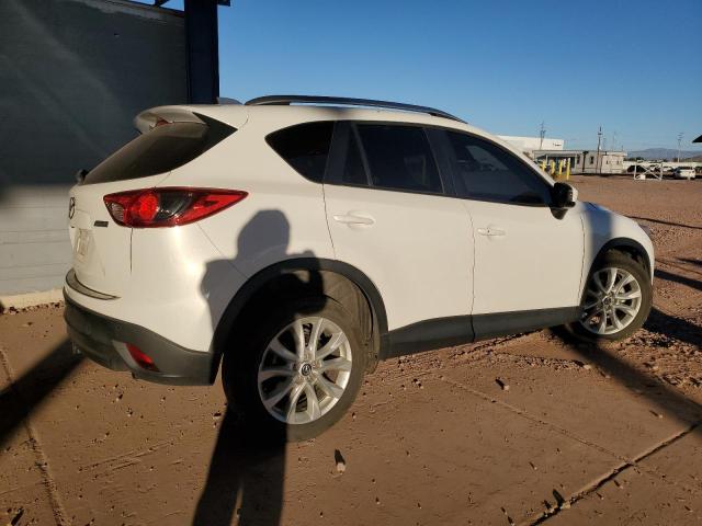 Photo 3 from auction – 2014 MAZDA CX-5 GT with VIN JM3KE2DY7E0387697