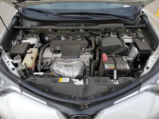 Photo 12 from auction – 2018 TOYOTA RAV4 LE with VIN JTMZFREV2JJ737159