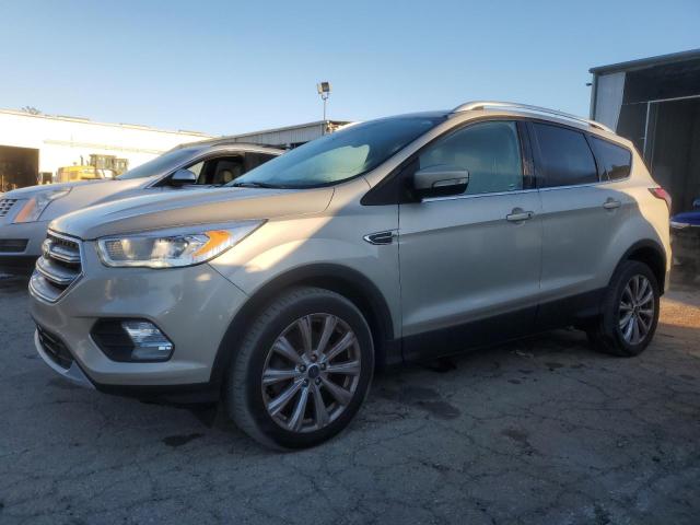 FORD ESCAPE TIT 2017 with VIN 1FMCU0J96HUD24889 - Photo from auction