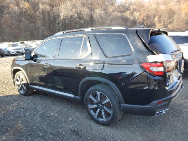 Photo 2 from auction – 2023 HONDA PILOT ELIT with VIN 5FNYG1H86PB019596