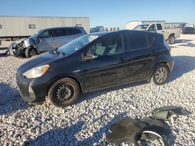 TOYOTA PRIUS C 2014 with VIN JTDKDTB31E1060599 - Photo from auction