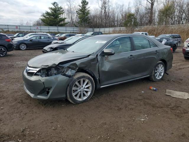 TOYOTA CAMRY HYBR 2014 with VIN 4T1BD1FK0EU126253 - Photo from auction