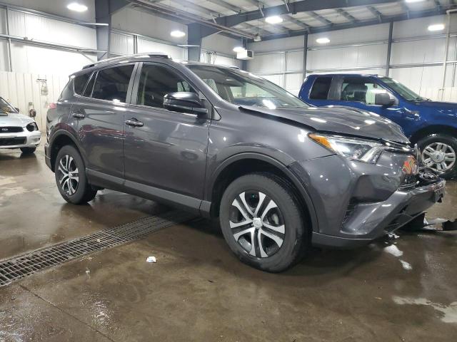 Photo 4 from auction – 2018 TOYOTA RAV4 LE with VIN JTMBFREV7JJ178564