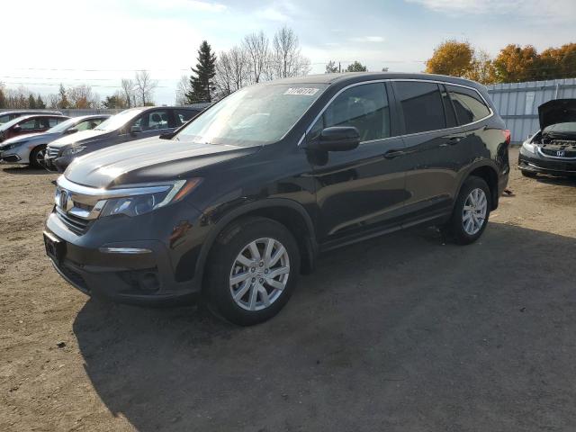 Photo 1 from auction – 2021 HONDA PILOT LX with VIN 5FNYF6H10MB504153