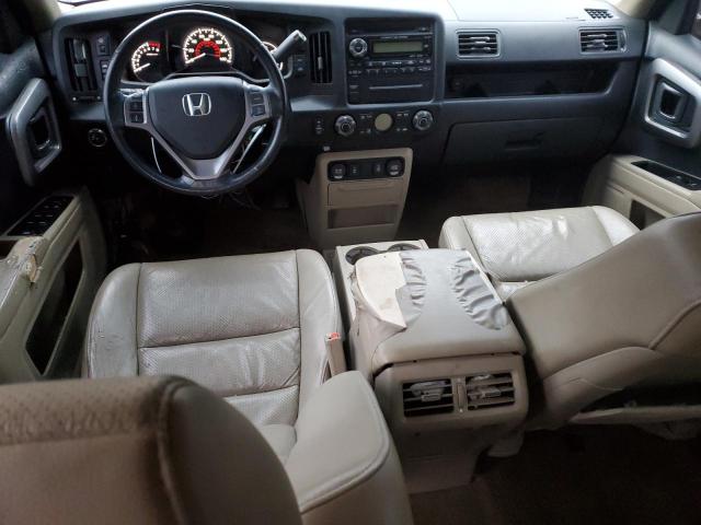 Photo 8 from auction – 2010 HONDA RIDGELINE with VIN 5FPYK1F52AB008522