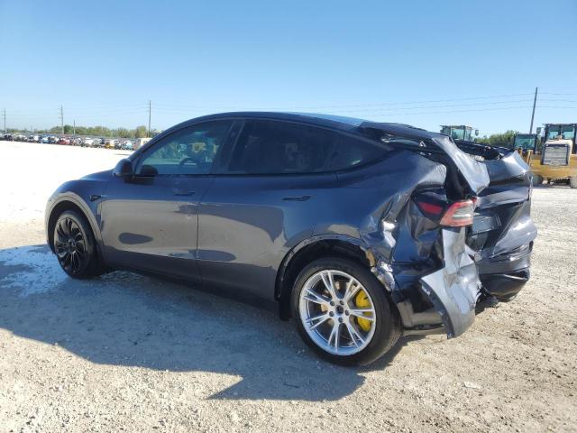 Photo 2 from auction – 2023 TESLA MODEL Y with VIN 7SAYGDEE1PF859414