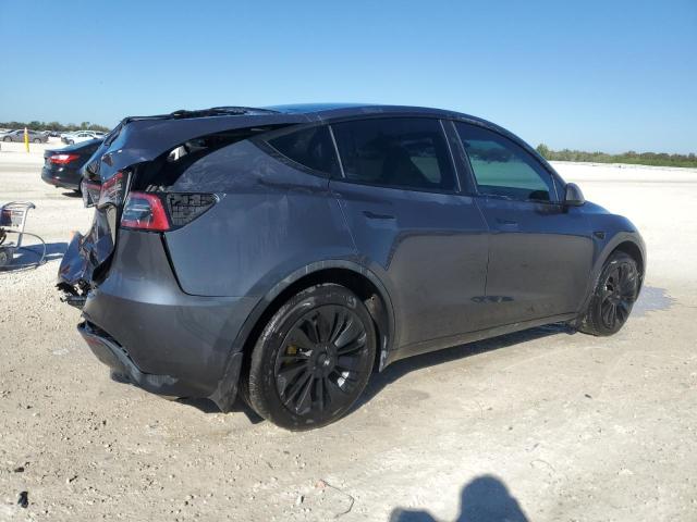 Photo 3 from auction – 2023 TESLA MODEL Y with VIN 7SAYGDEE1PF859414