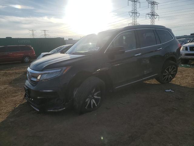 HONDA PILOT TOUR 2021 with VIN 5FNYF6H96MB062632 - Photo from auction