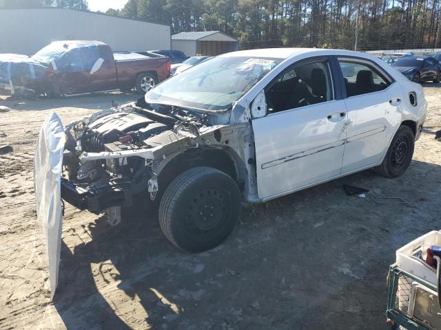 TOYOTA COROLLA L 2017 with VIN 5YFBURHE8HP697131 - Photo from auction