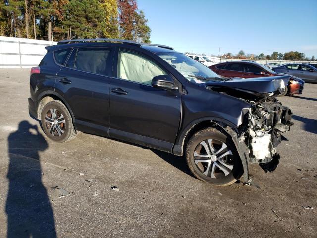 Photo 4 from auction – 2017 TOYOTA RAV4 LE with VIN JTMZFREV5HJ701461