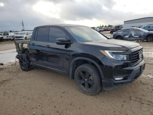 Photo 4 from auction – 2022 HONDA RIDGELINE with VIN 5FPYK3F83NB016964