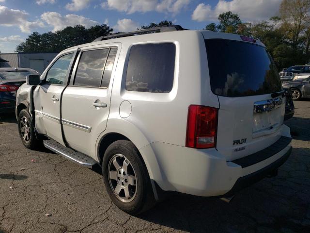 Photo 2 from auction – 2011 HONDA PILOT TOUR with VIN 5FNYF3H98BB049165