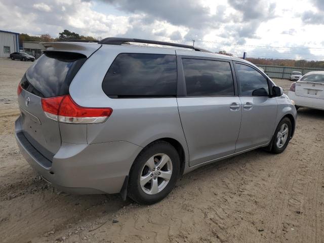 Photo 3 from auction – 2014 TOYOTA SIENNA LE with VIN 5TDKK3DC9ES472677