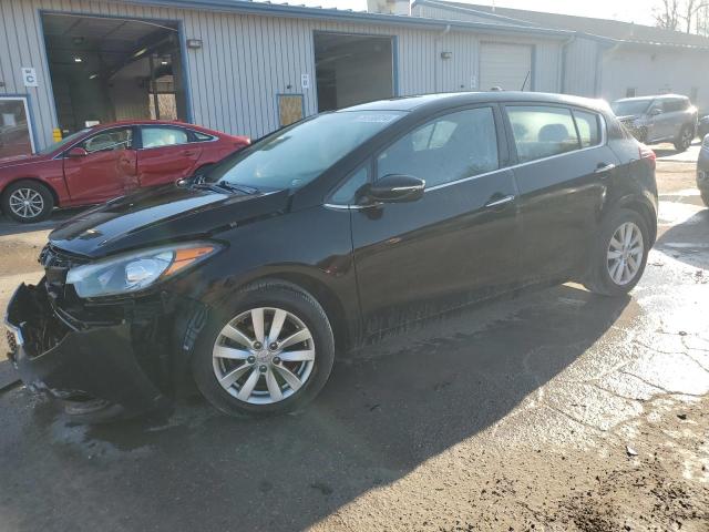 KIA FORTE EX 2014 with VIN KNAFX5A84E5195552 - Photo from auction