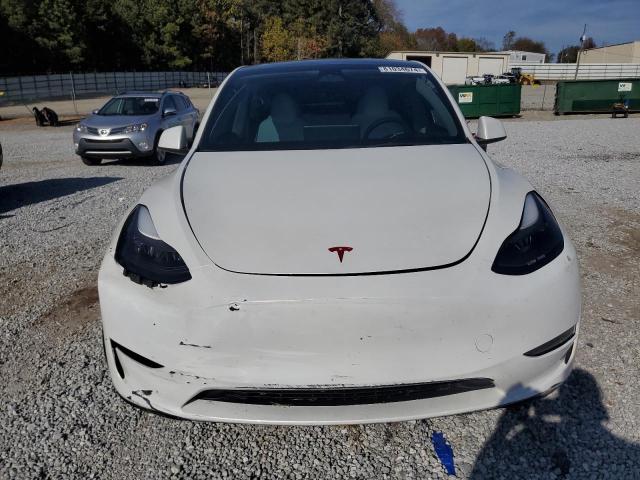 Photo 5 from auction – 2023 TESLA MODEL Y with VIN 7SAYGDEE6PF782409