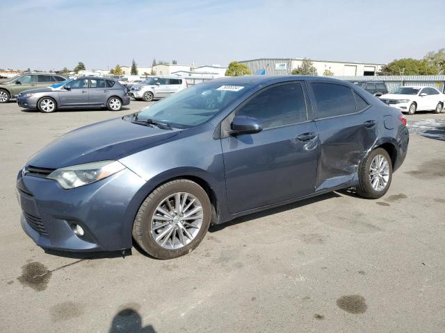 TOYOTA COROLLA L 2014 with VIN 5YFBURHE5EP024213 - Photo from auction