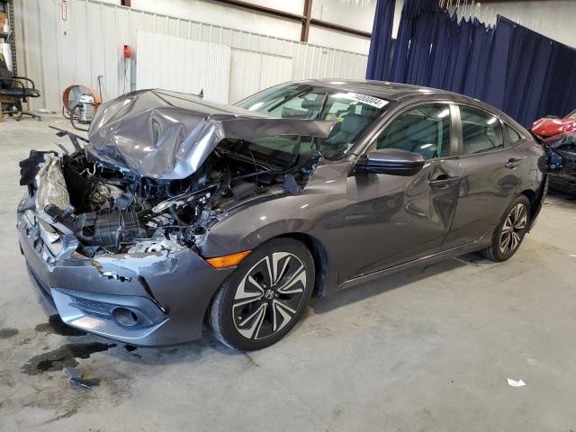 HONDA CIVIC EX 2017 with VIN 19XFC1F31HE011407 - Photo from auction