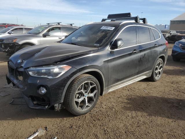 BMW X1 XDRIVE2 2016 with VIN WBXHT3C31GP889249 - Photo from auction