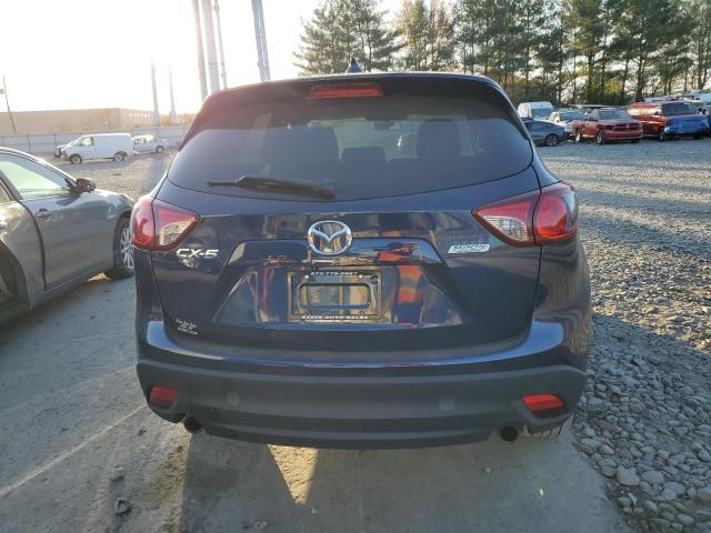 Photo 6 from auction – 2013 MAZDA CX-5 TOURI with VIN JM3KE4CE1D0164671