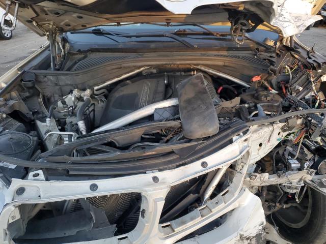 Photo 12 from auction – 2014 BMW X5 XDRIVE3 with VIN 5UXKR0C5XE0K50177