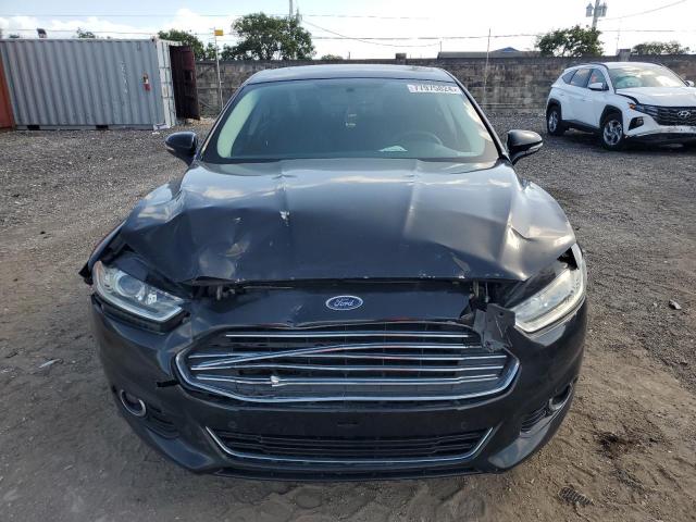 Photo 5 from auction – 2014 FORD FUSION TIT with VIN 3FA6P0K99ER118689