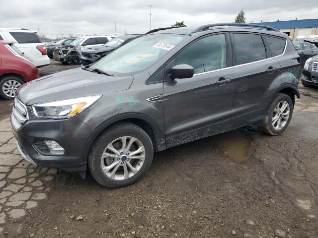 FORD ESCAPE SE 2018 with VIN 1FMCU9GD1JUC45202 - Photo from auction