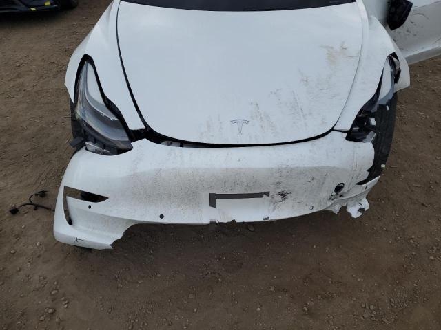 Photo 11 from auction – 2021 TESLA MODEL 3 with VIN 5YJ3E1EA3MF990803