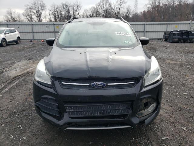 Photo 5 from auction – 2015 FORD ESCAPE SE with VIN 1FMCU9G99FUA98226