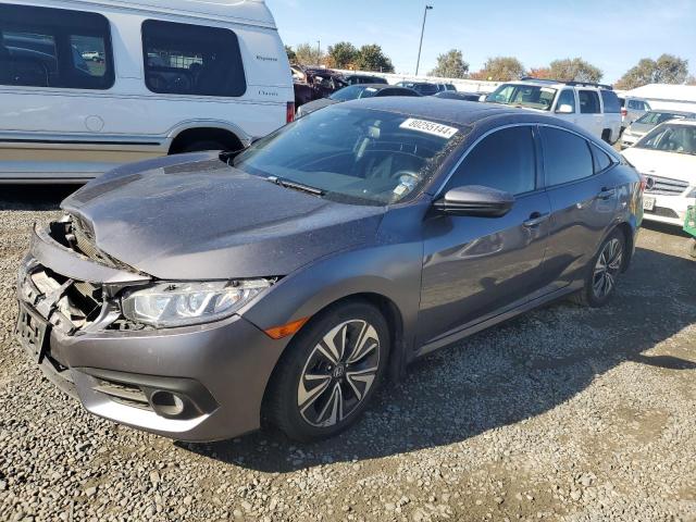 HONDA CIVIC EXL 2016 with VIN 2HGFC1F74GH650212 - Photo from auction