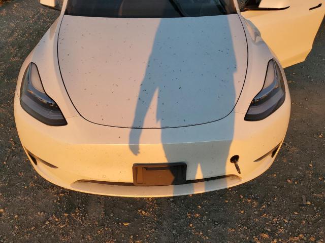 Photo 11 from auction – 2021 TESLA MODEL Y with VIN 5YJYGDEE4MF254621