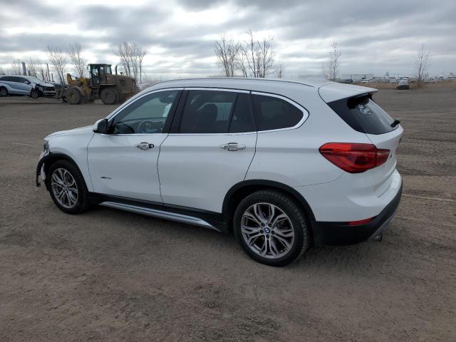 Photo 2 from auction – 2016 BMW X1 XDRIVE2 with VIN WBXHT3C36G5E47551
